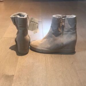 DKNY never worn suede heel boots. Real fur sheep